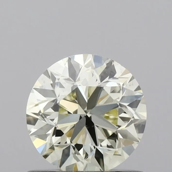 0.70ct Round Natural Diamond (Colour M, Clarity VS1, Cut VG, IGI Certified)